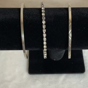 Metal bangle bracelets, three designs. Plain, rhinestone, etched.
